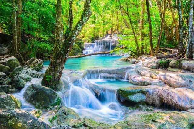 Damnoen Saduak Floating Market & Erawan Waterfall Day Tour sightseeing activity hero photo - Bangkok travel experience