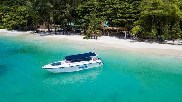 Kahung Beach at Coral Island by Speedboat sightseeing activity hero photo - Phuket travel experience